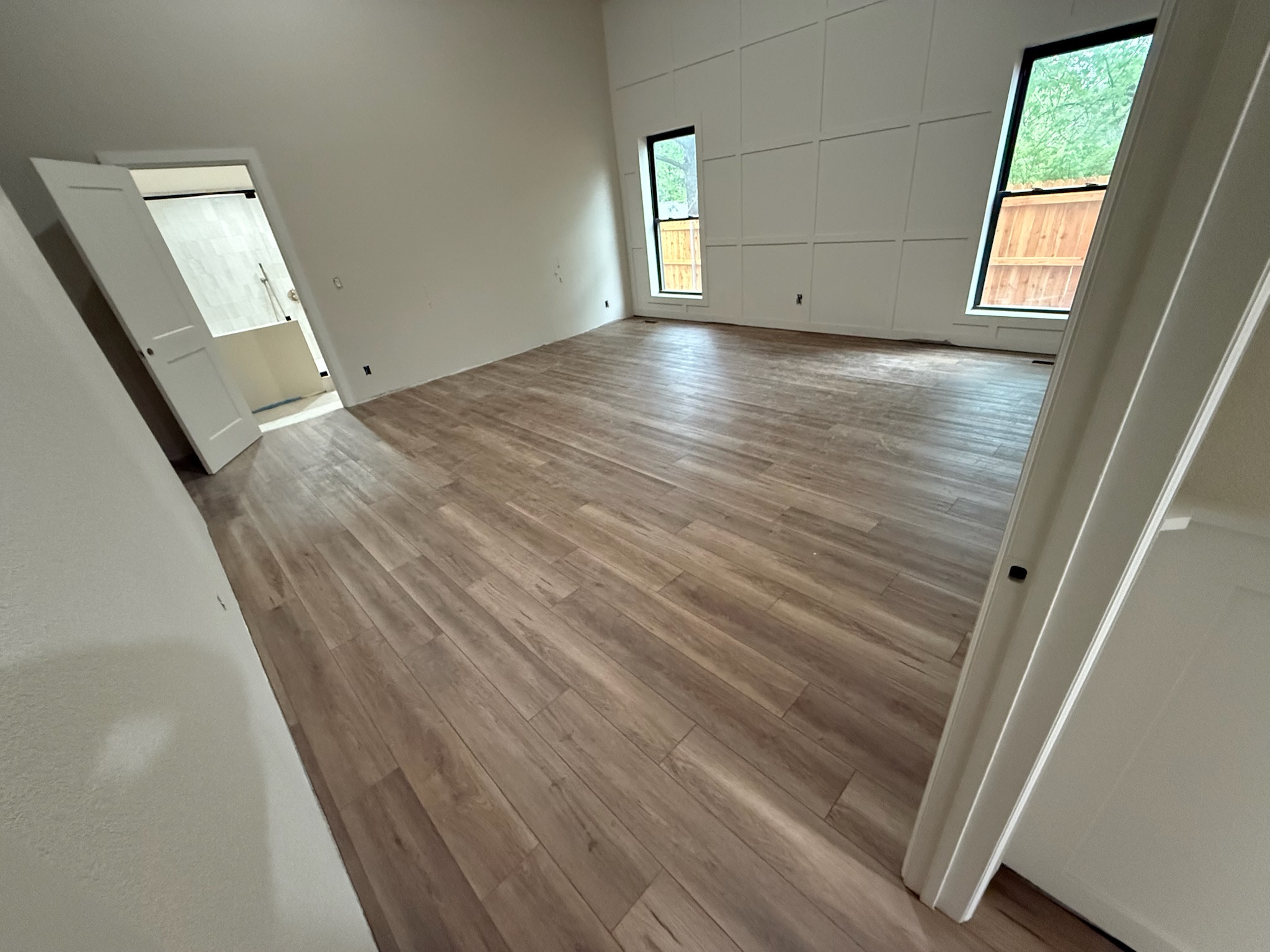 Luxury vinyl plank flooring installation in a Tulsa home by Reyna Tile & Flooring